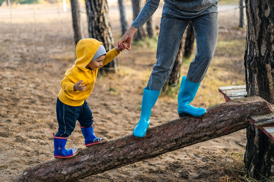 Parent and child on tree branch