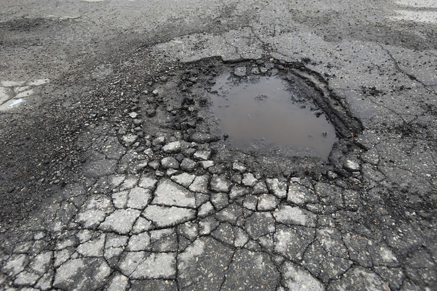 Pothole in road