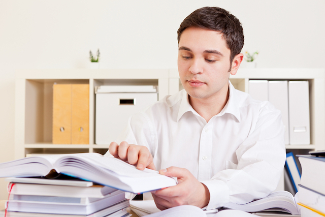 A young man studying