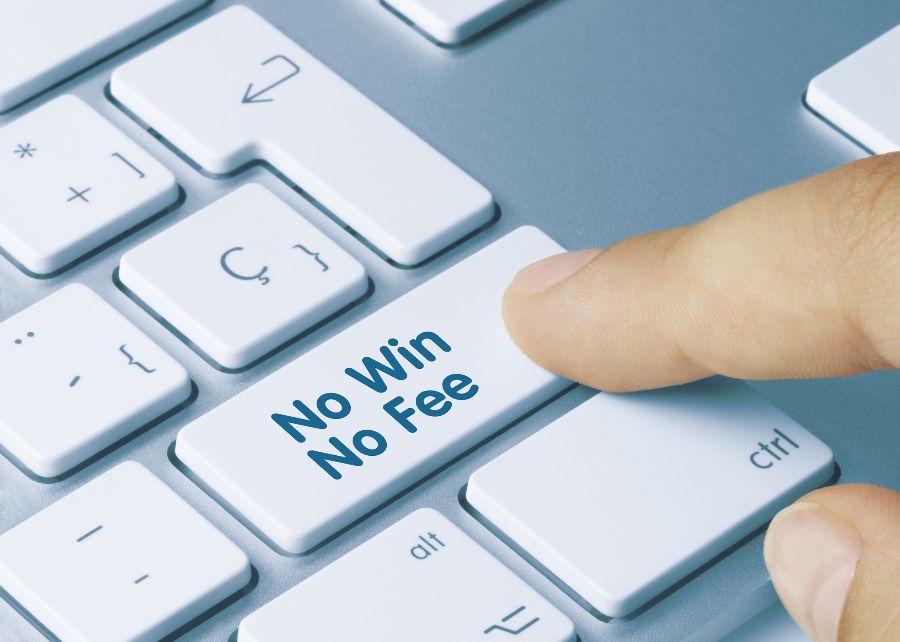 A keyboard with a large No Win No Fee button