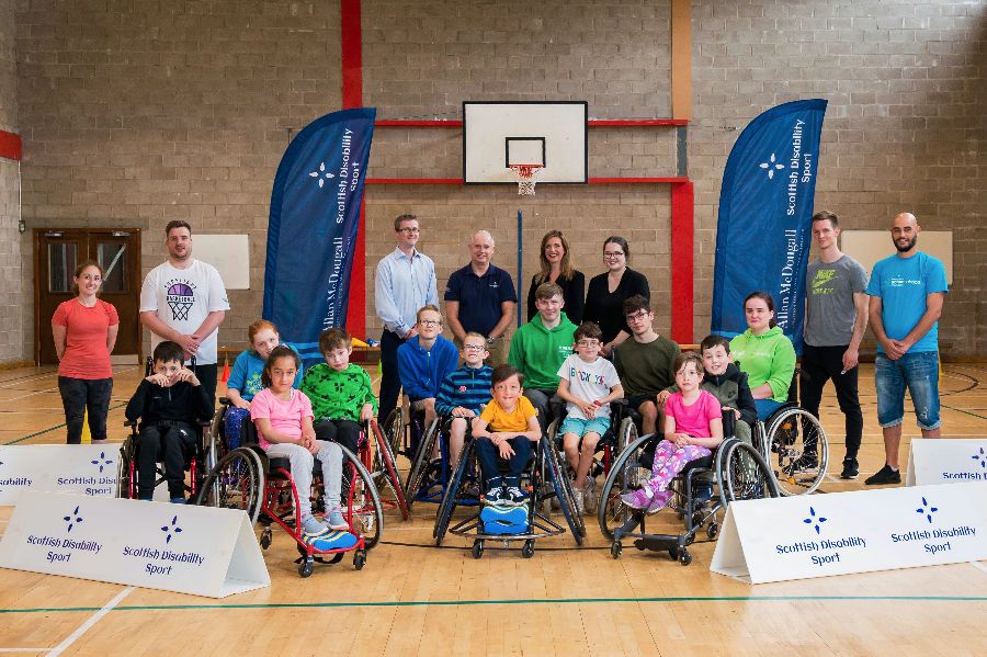 Young wheelchair athletes supporting Scottish Disability Sport