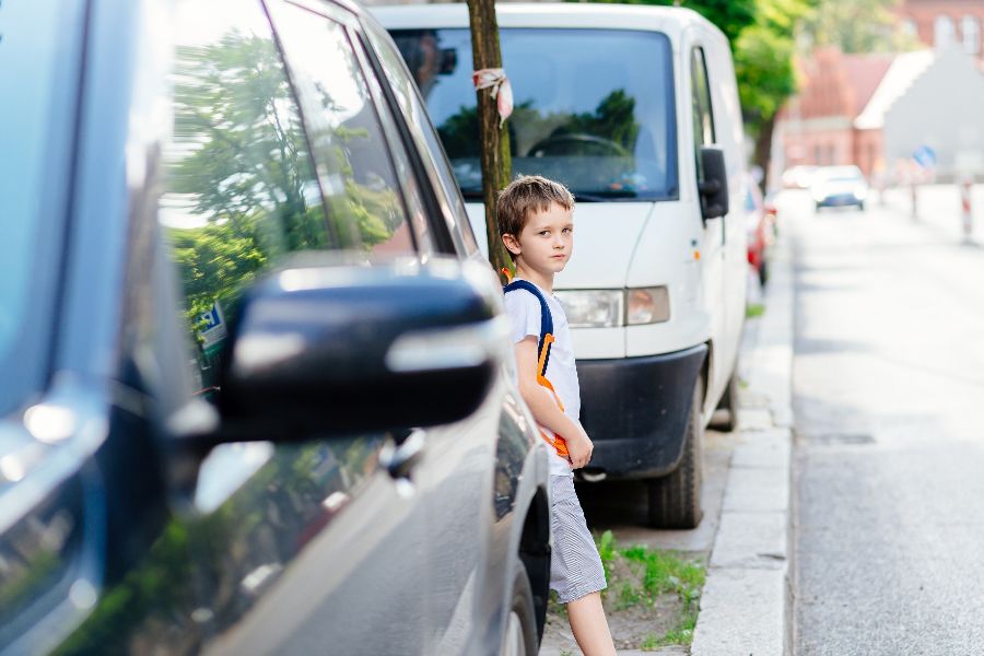 A child crossing a road