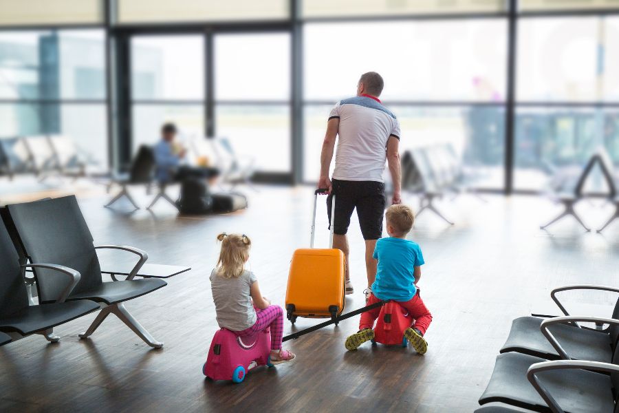 A father on holiday with his children