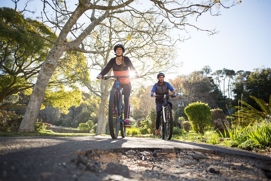 Two people enjoying a ride on their bicycles