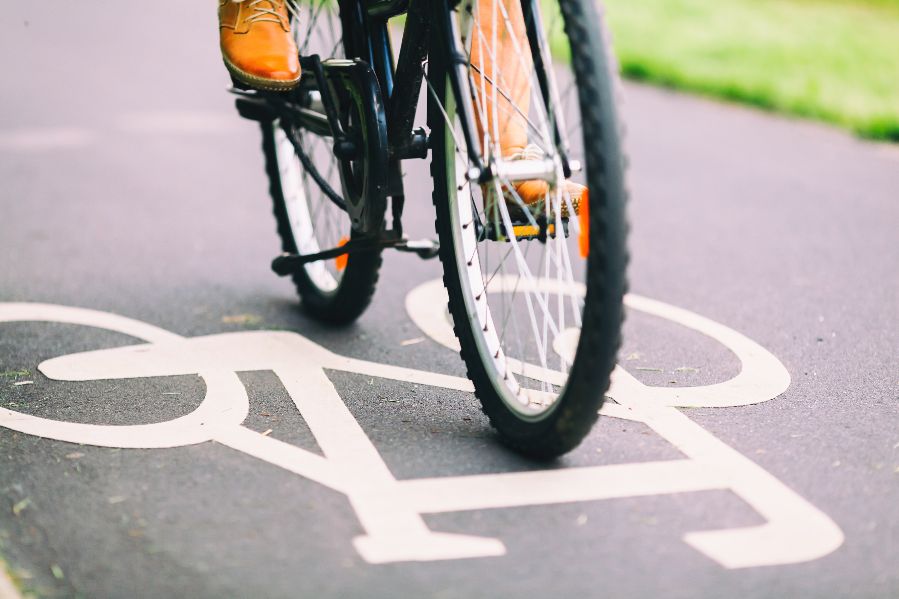 Close up of a bicycle travelling along a road