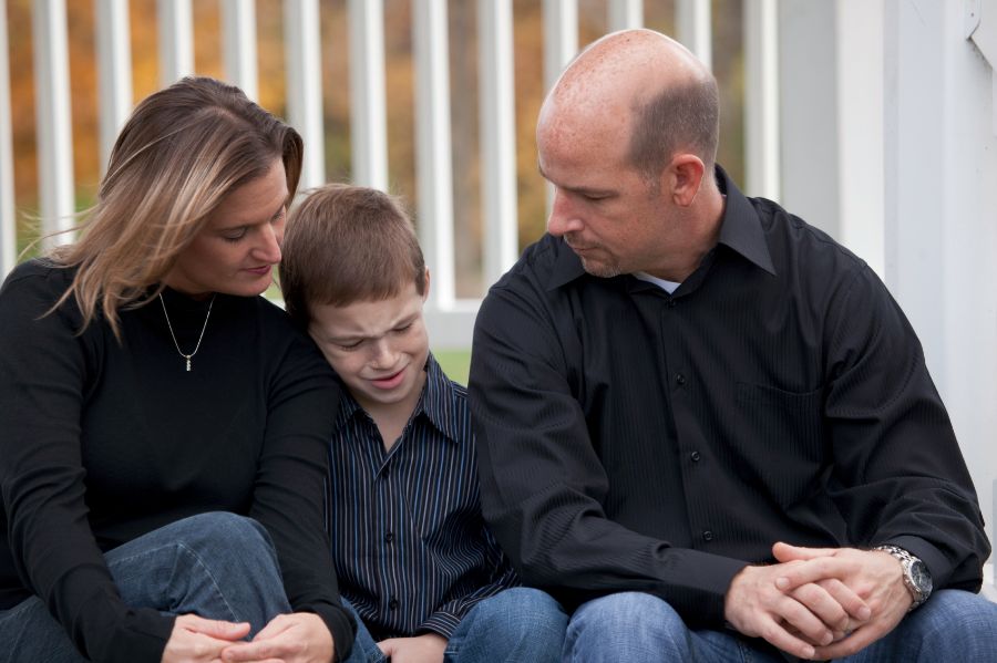 Mother, father and upset child