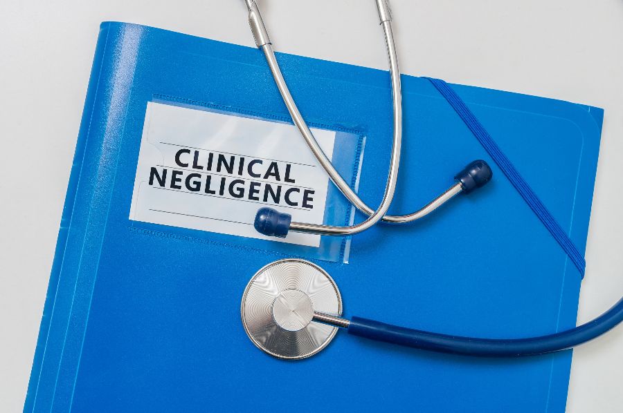 A folder marked &quot;Criminal Negligence&quot; and stethoscope